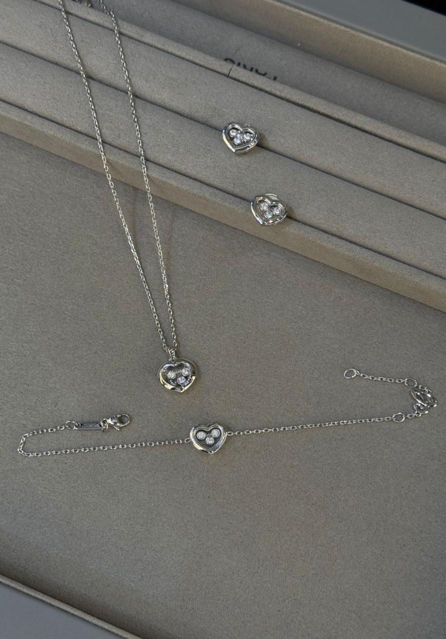 Chopard Happy Diamonds Happy Hearts Four-Piece Jewelry Set — -Tone Heart Necklace, Bracelet, Stud Earrings & Ring with Floating Stone