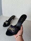 اChanel CC Bow Embellished Kitten Heel Mules