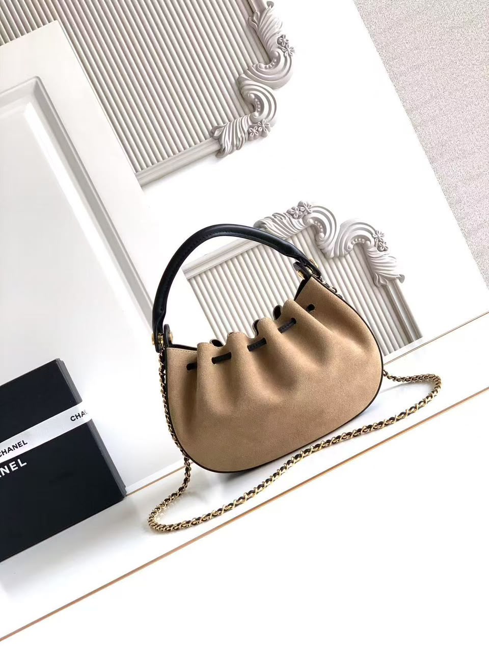 CHANEL Drawstring Top-Handle Chain Bag