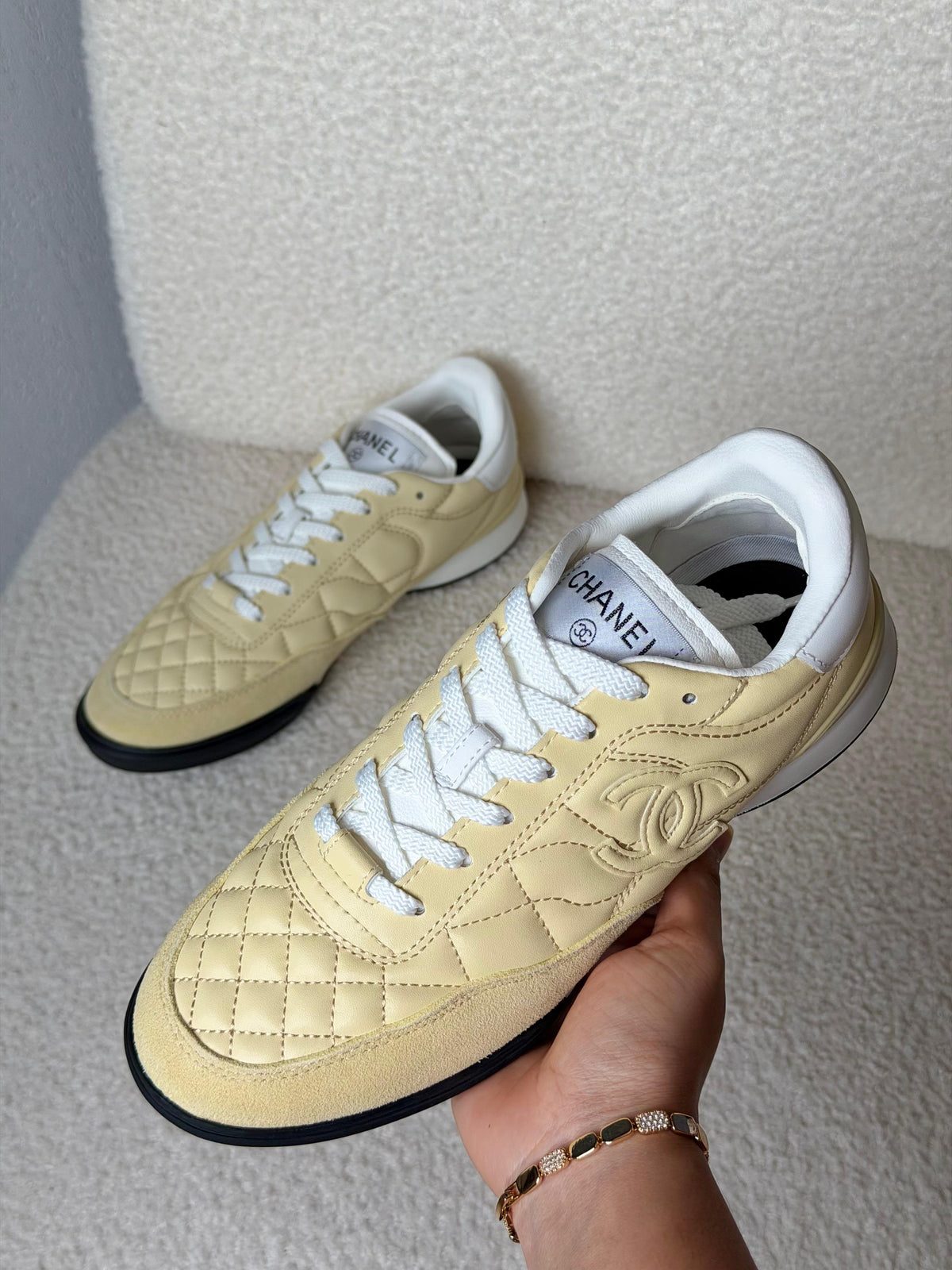 Chanel Quilted CC Logo Low-Top Sneakers