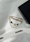 Chanel Script Logo Pearl Chain Brooch