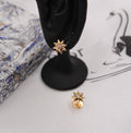 Dior Rose des Vents Star earrings