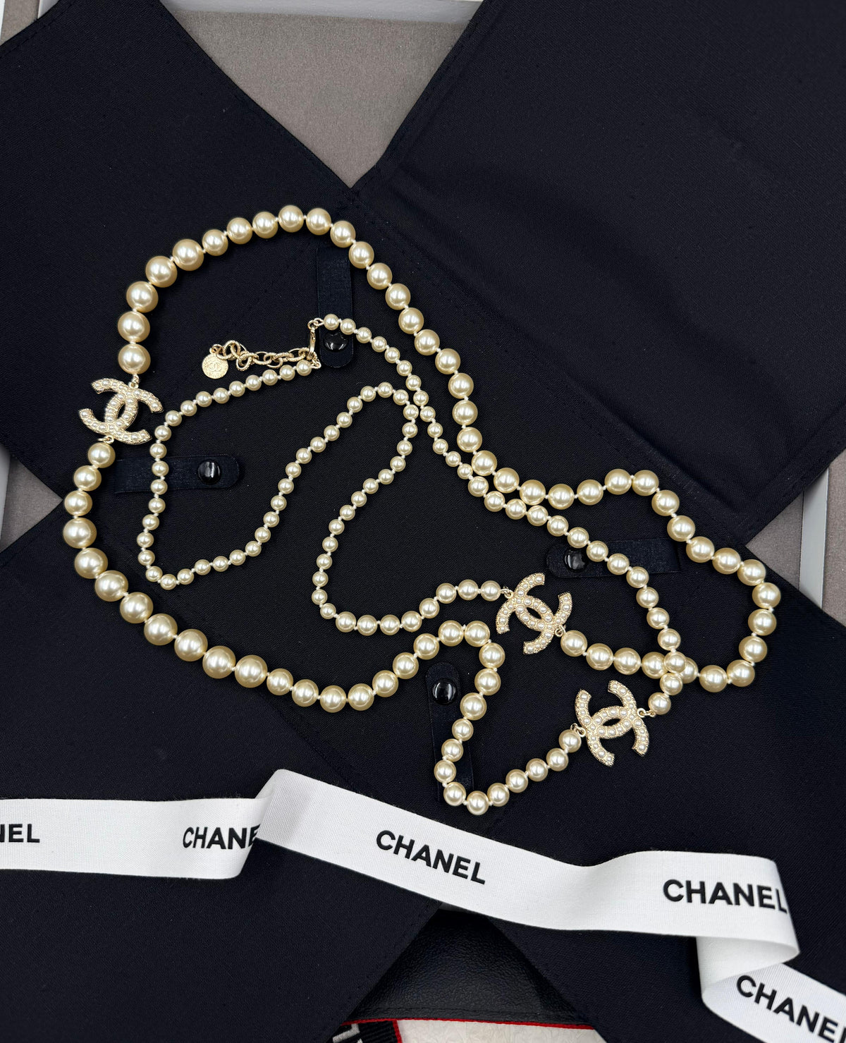Chanel Long Pearl Necklace with CC Logo