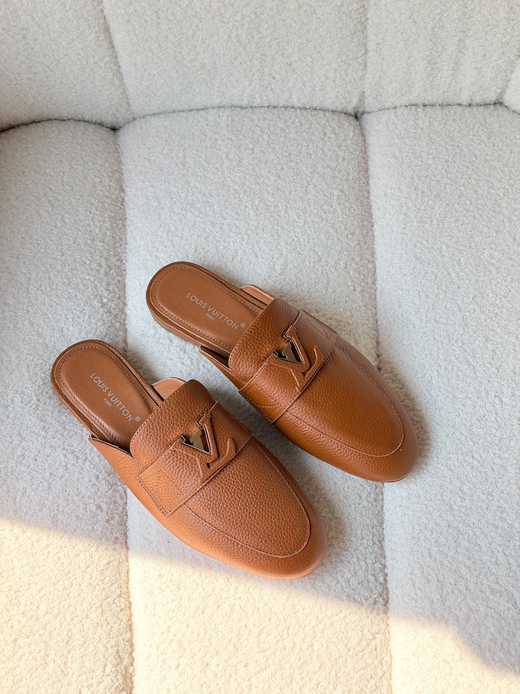 Louis Vuitton LV Emblem Grained Leather Mules