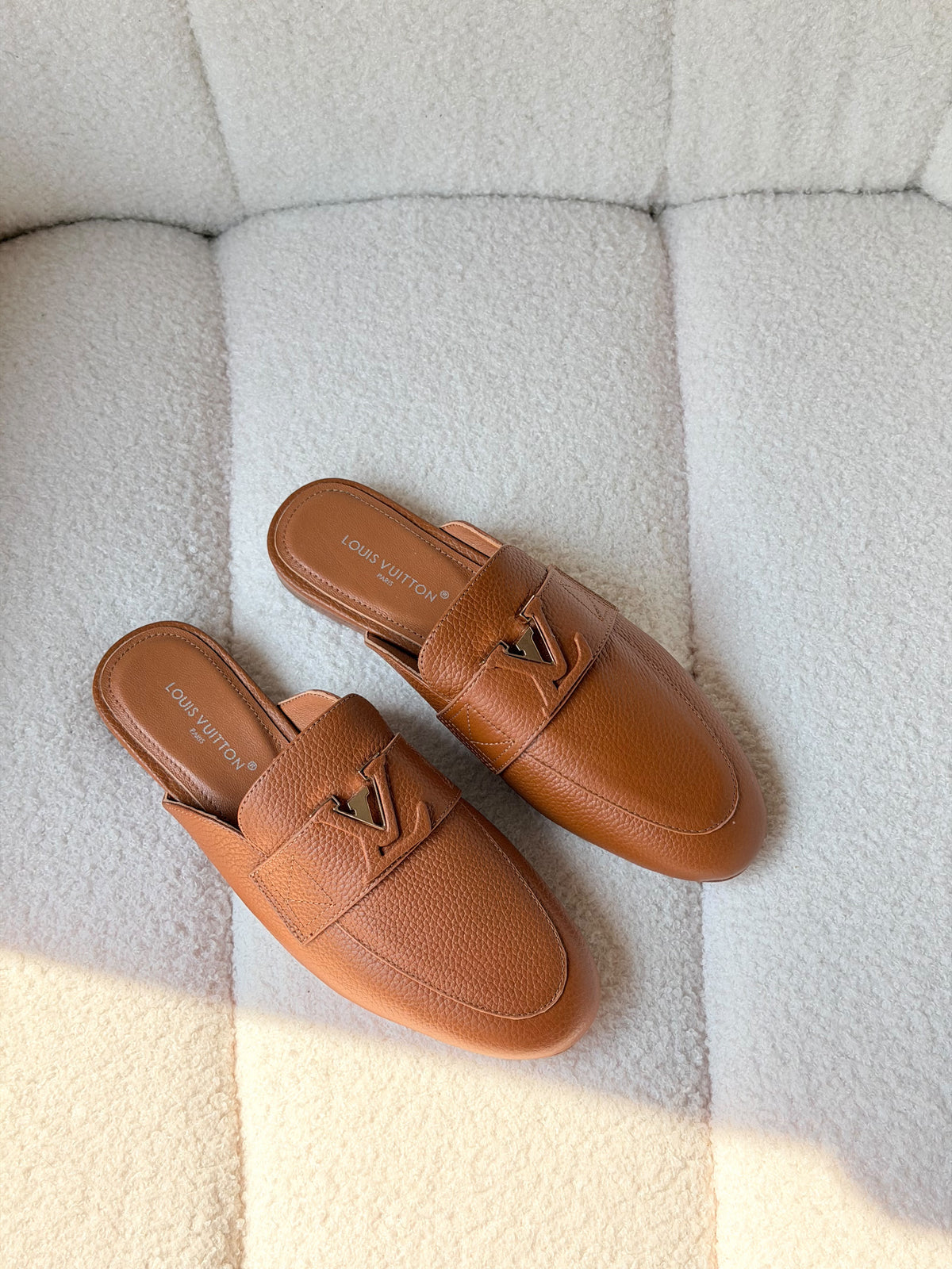 Louis Vuitton LV Emblem Grained Leather Mules