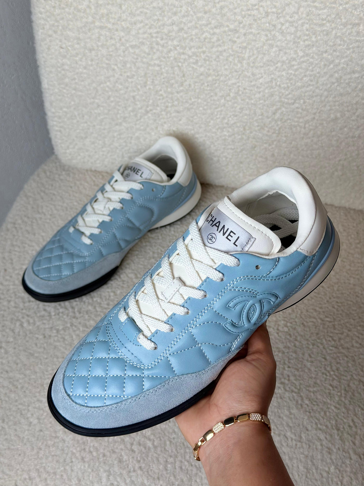 Chanel Quilted CC Logo Low-Top Sneakers