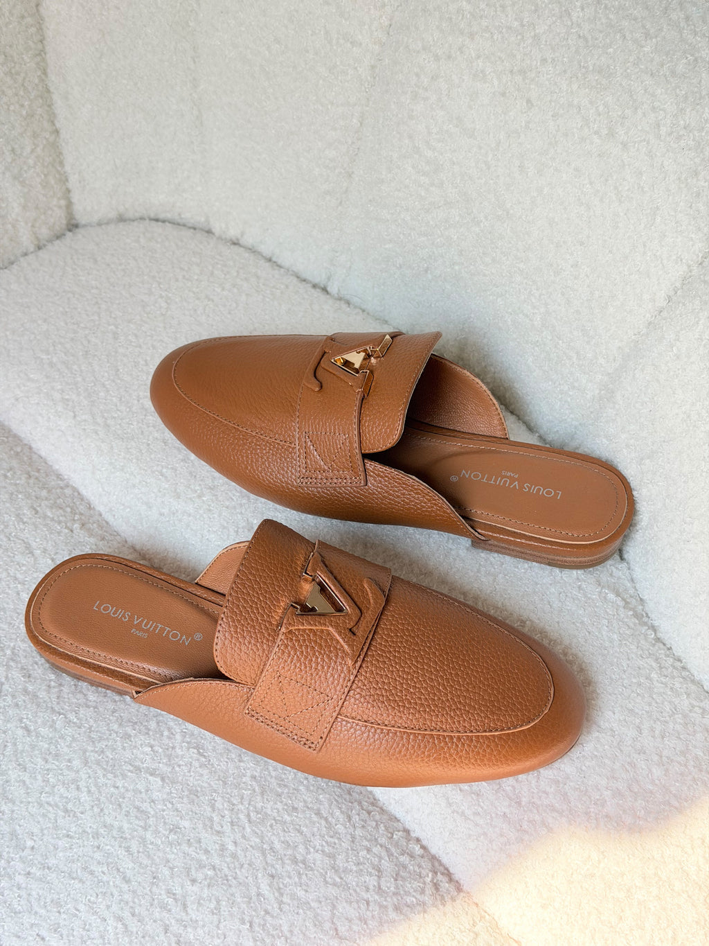Louis Vuitton LV Emblem Grained Leather Mules