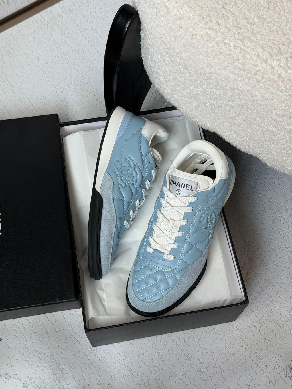 Chanel Quilted CC Logo Low-Top Sneakers