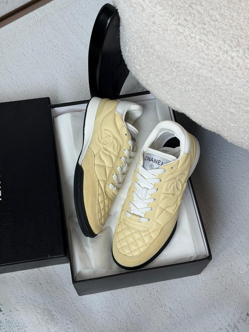 Chanel Quilted CC Logo Low-Top Sneakers