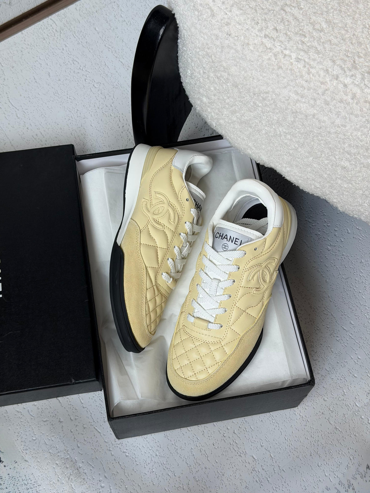 Chanel Quilted CC Logo Low-Top Sneakers