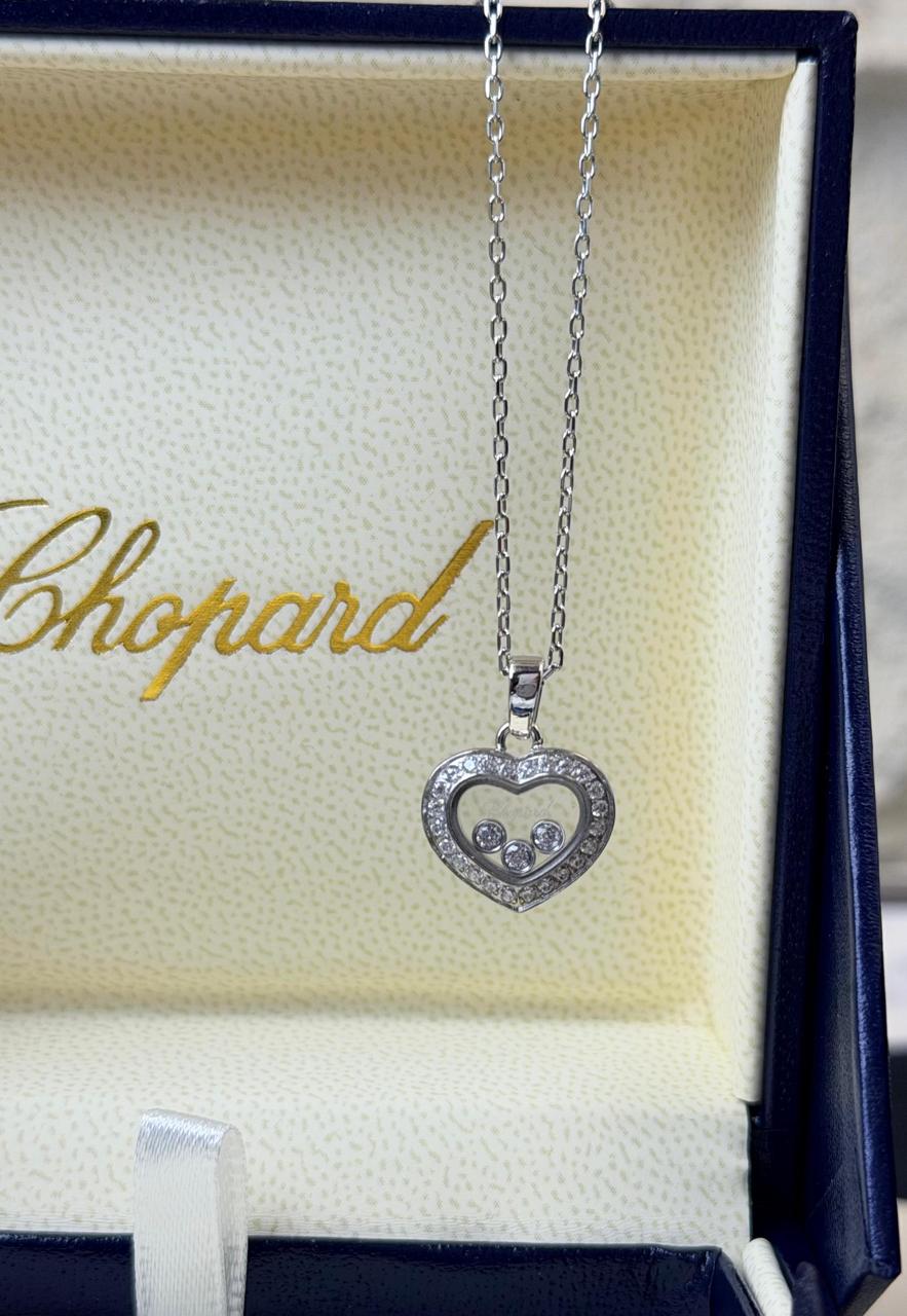 Chopard Happy Diamonds Heart Pendant Necklace — White-Tone Metal with Three Floating Stones and Pavé-Set Heart Border.