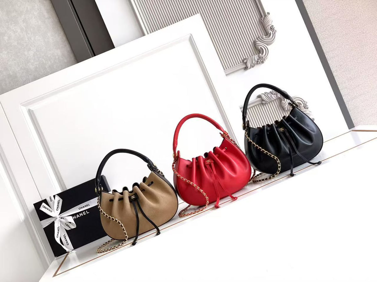 CHANEL Drawstring Top-Handle Chain Bag