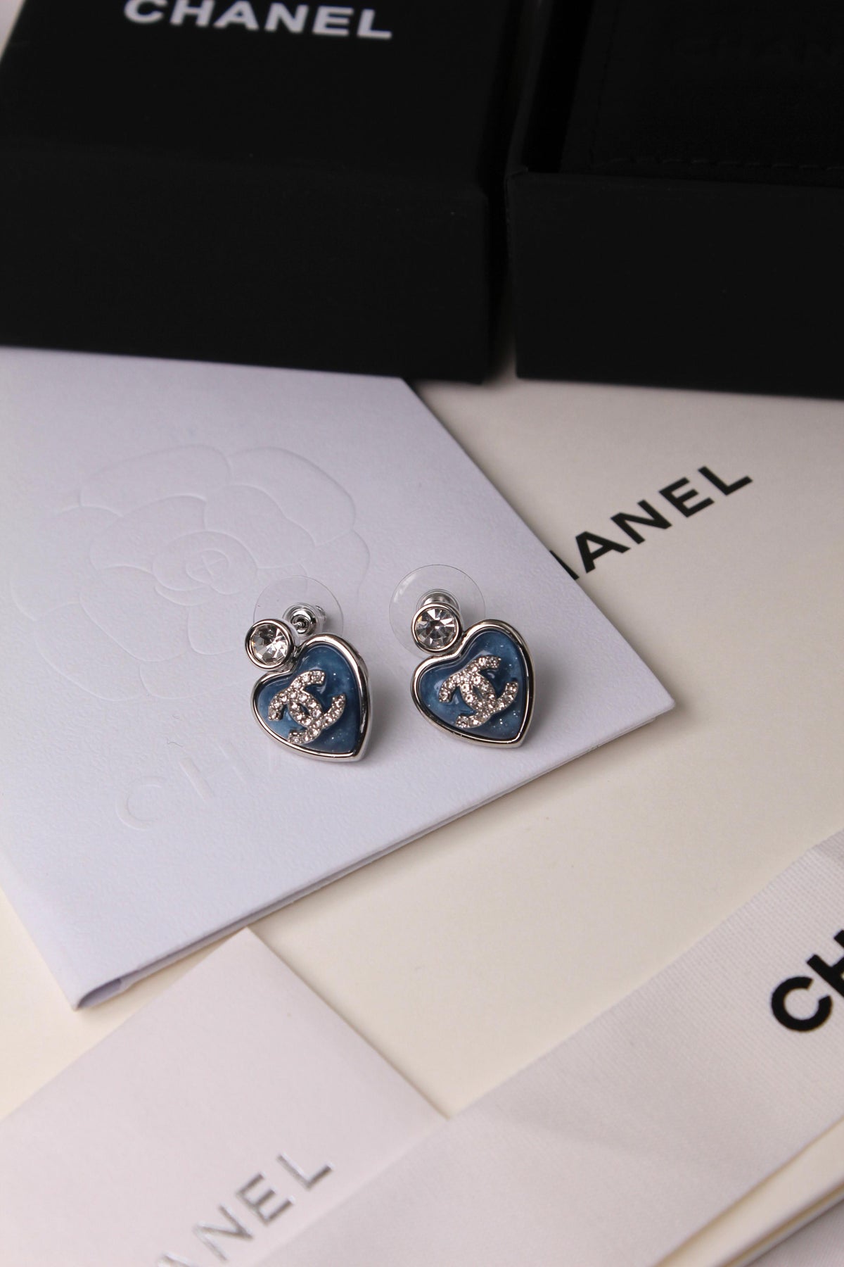 CHANEL – Blue Heart CC Crystal Earrings