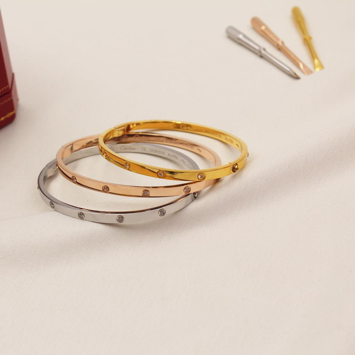 Cartier LOVE Small Model Bracelets with Diamonds in Yellow Gold, Rose Gold and White Gold