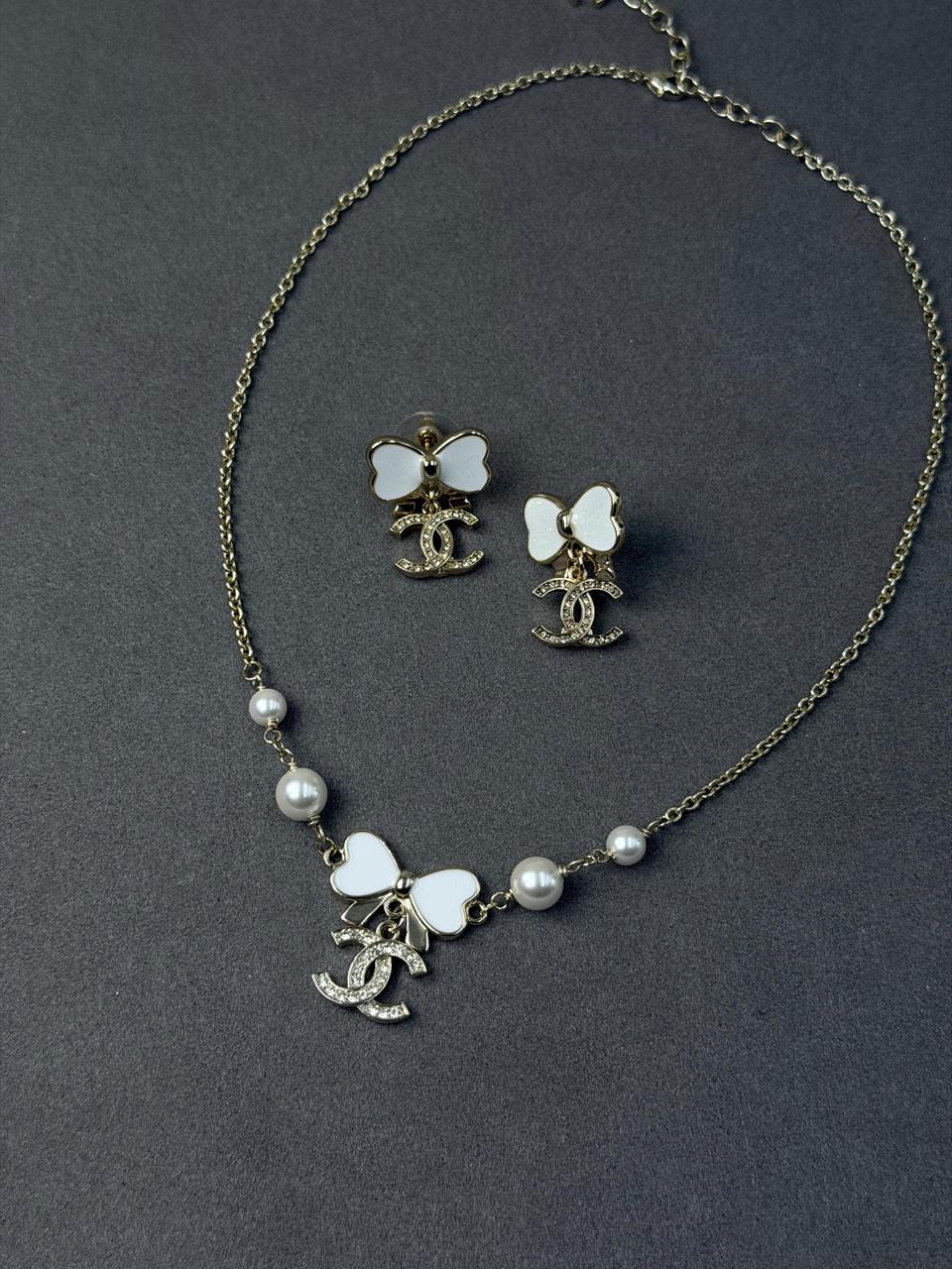Chanel White Bow Pearl Necklace and Earrings Set