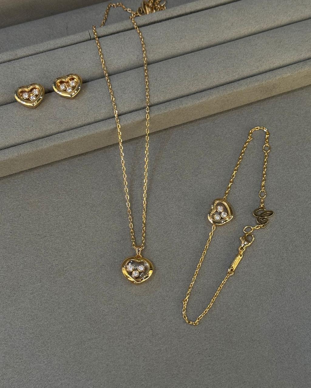 Chopard Happy Diamonds Happy Hearts Four-Piece Jewelry Set — -Tone Heart Necklace, Bracelet, Stud Earrings & Ring with Floating Stone