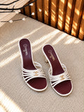 Chanel Strappy Mules with CC Logo