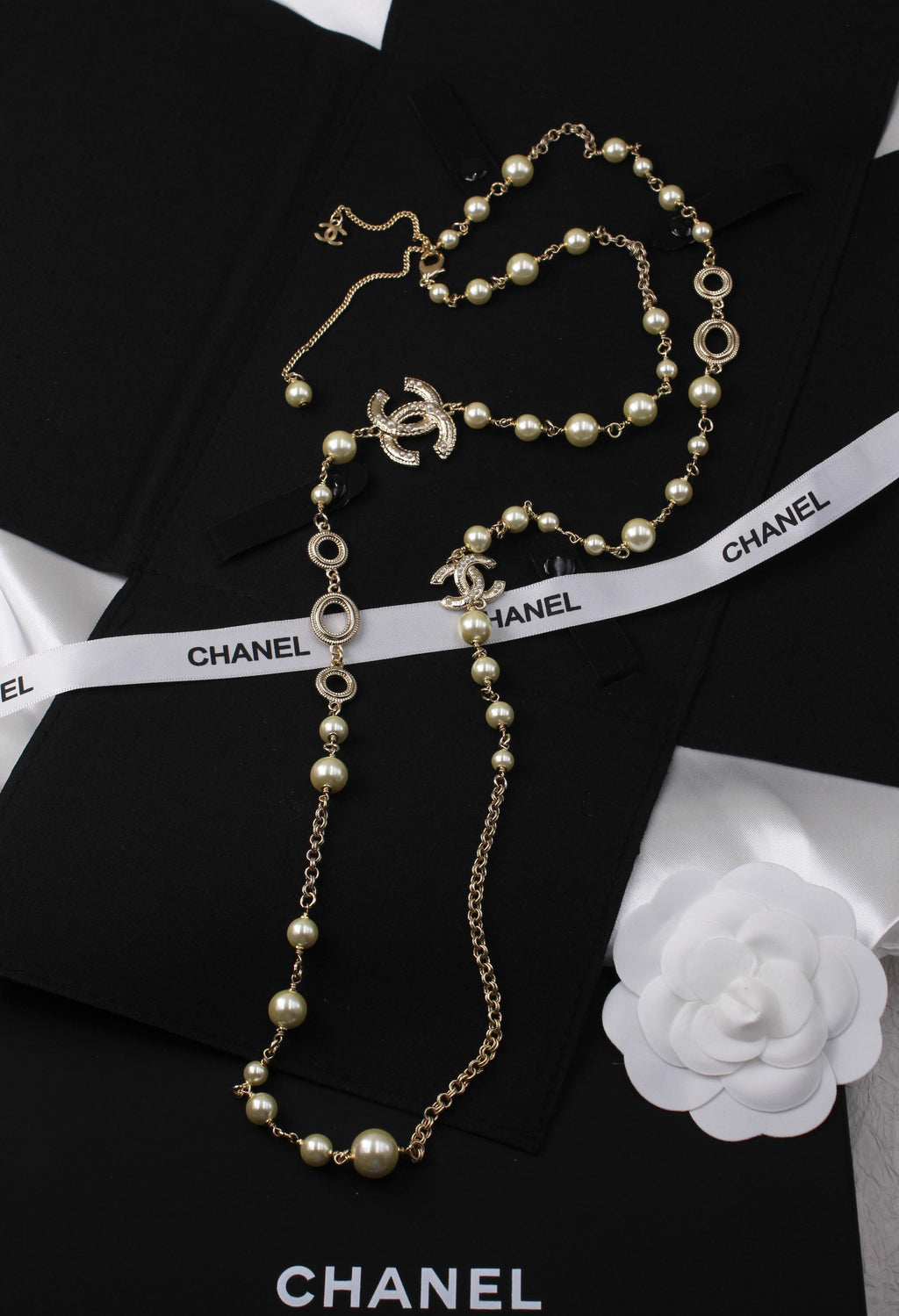 Chanel Long Pearl Necklace with CC Logo