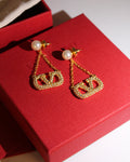 Valentino Garavani V Logo Earrings