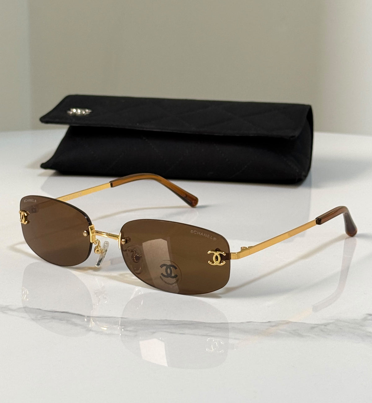 Chanel Rimless Sunglasses with CC Logo