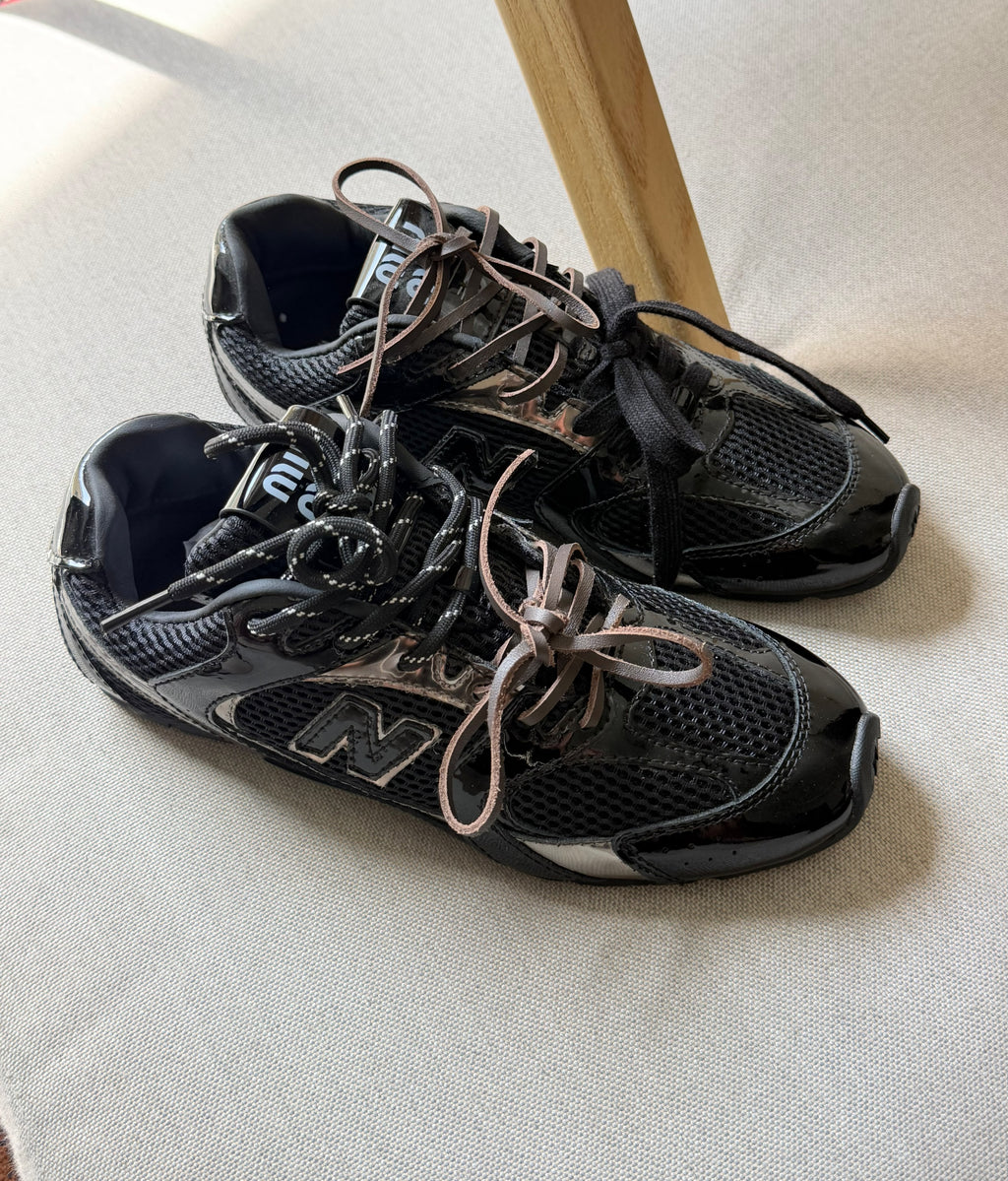 New Balance x Miu Miu 530 SL Distressed Sneakers