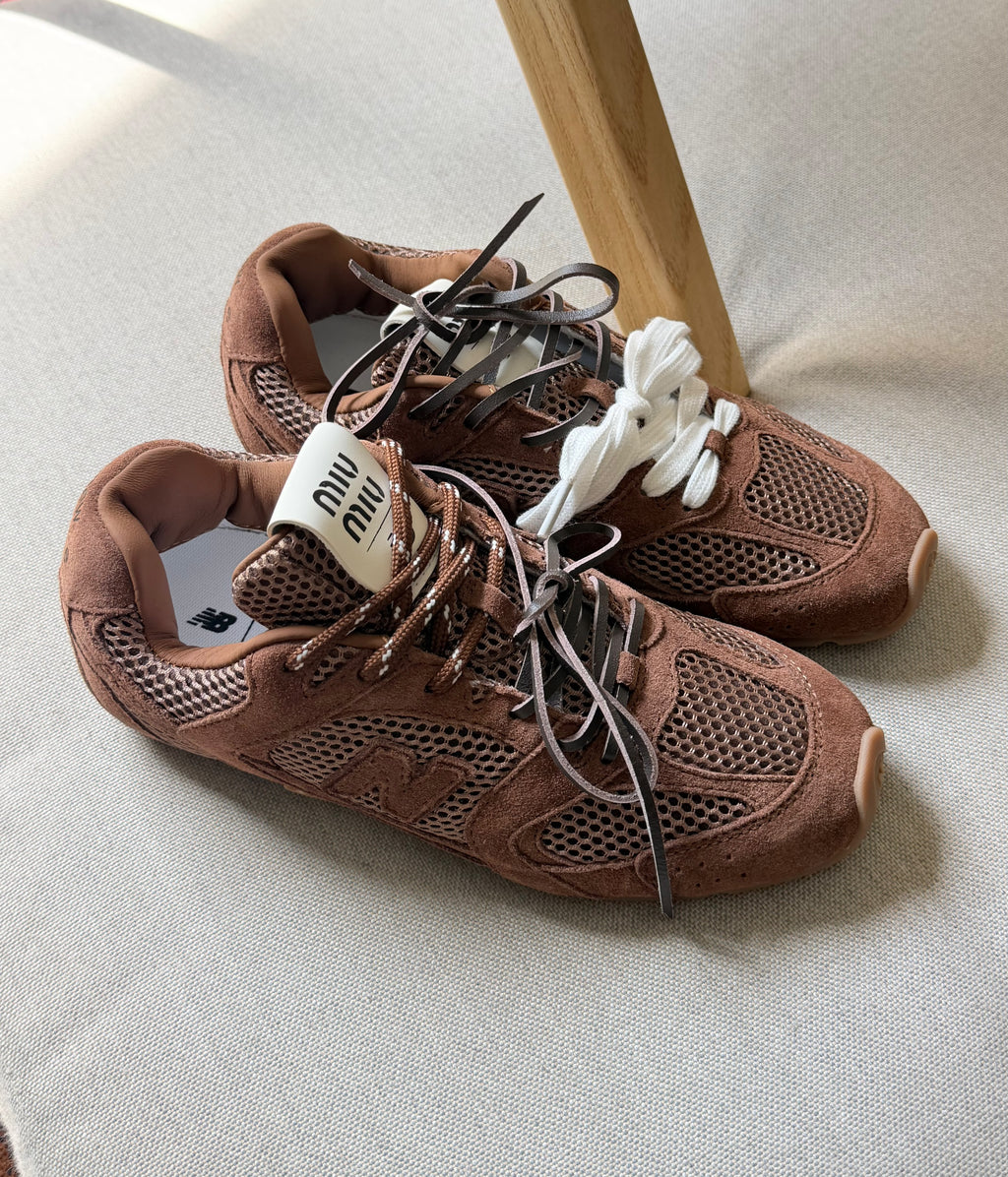 New Balance x Miu Miu 530 SL Distressed Sneakers