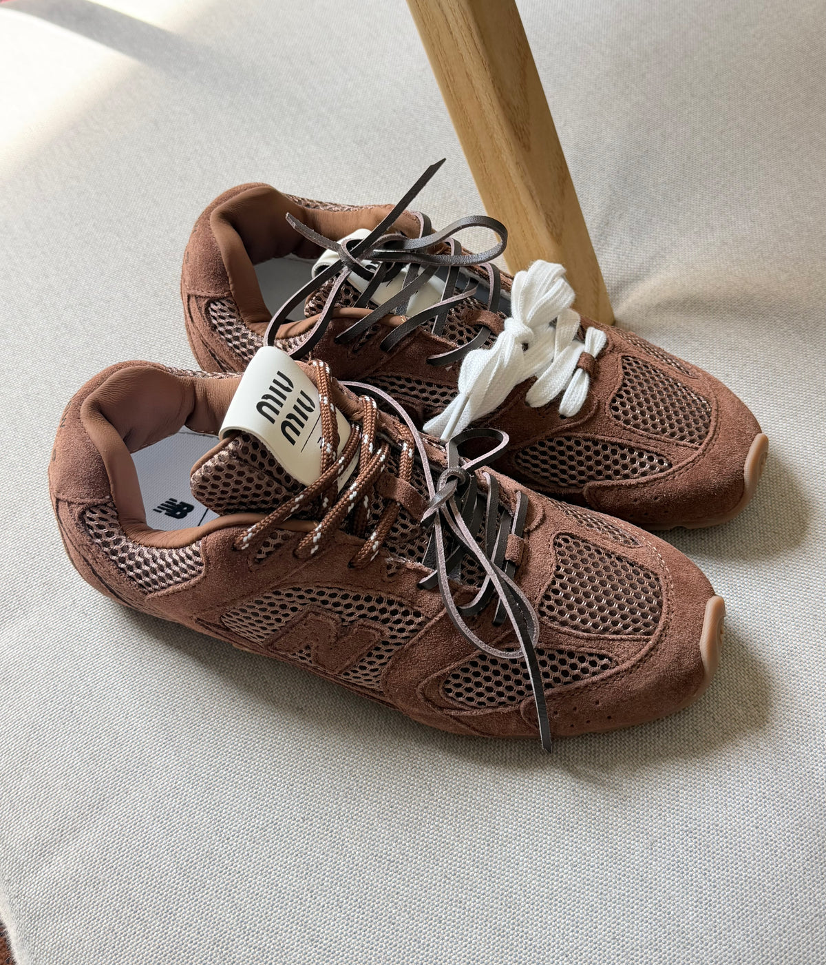 New Balance x Miu Miu 530 SL Distressed Sneakers