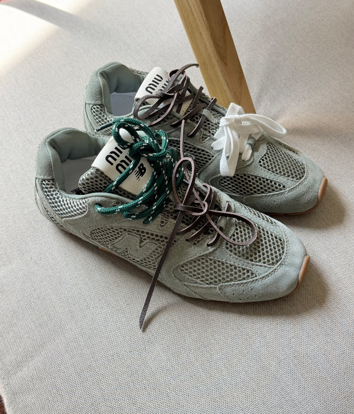 New Balance x Miu Miu 530 SL Distressed Sneakers