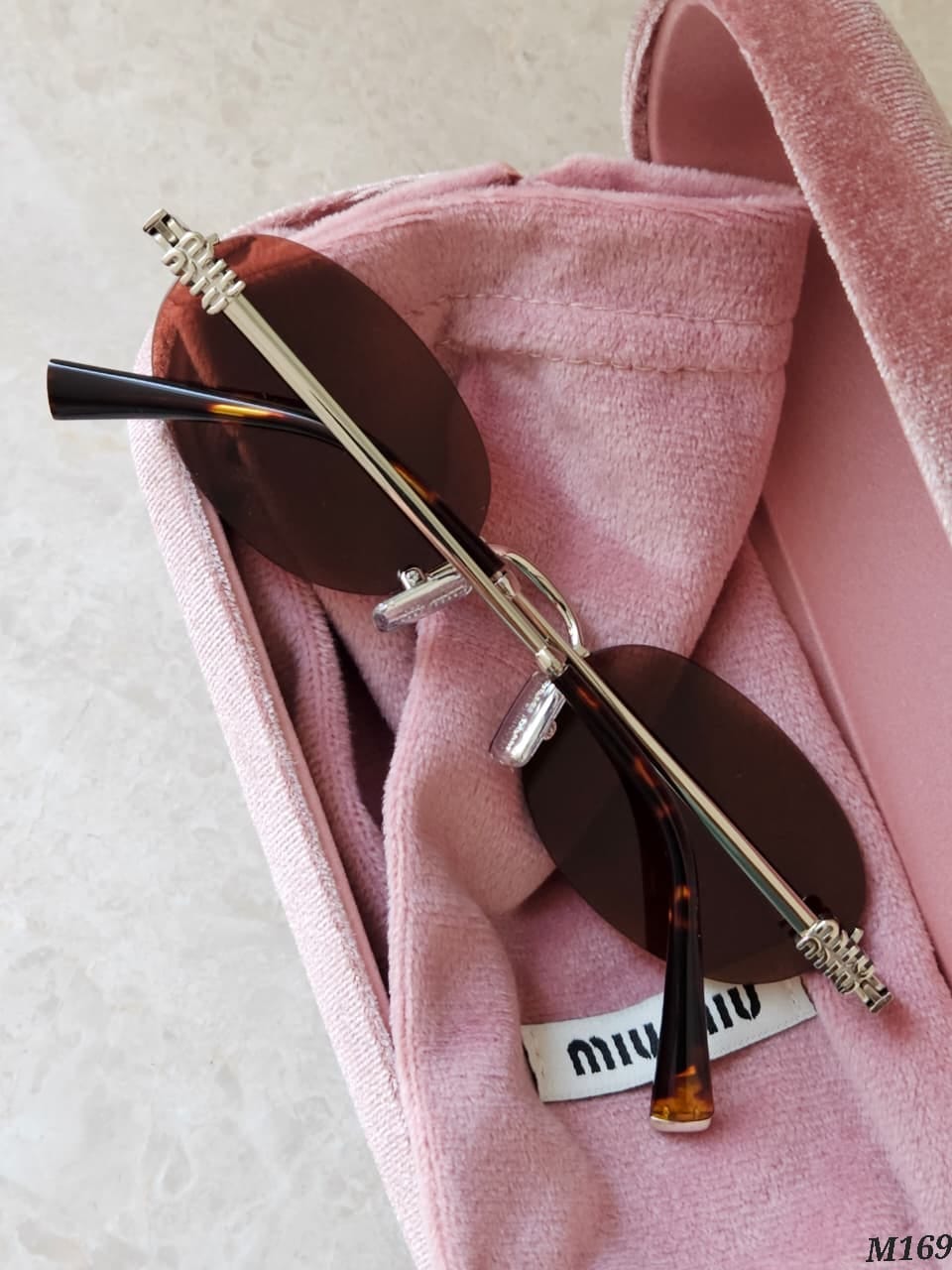MiU MiU  Sunglasses