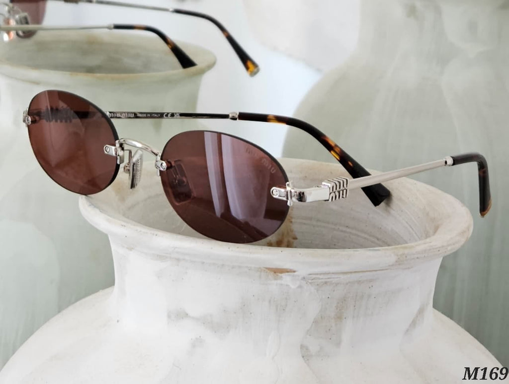 MiU MiU  Sunglasses