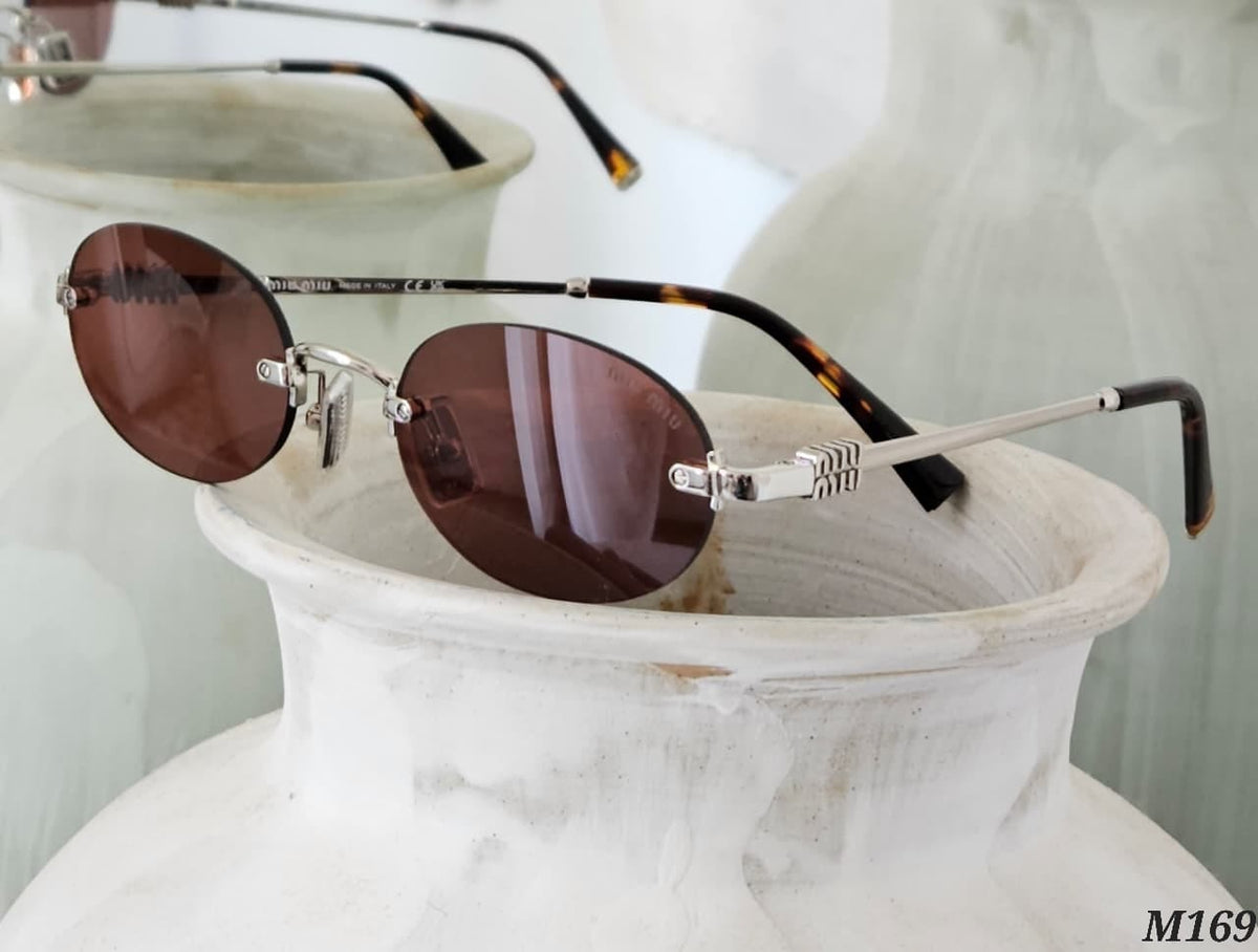 MiU MiU  Sunglasses