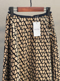Valentino Garavani — V-Logo Pockets Splittable Gabardine Midi Skirt.