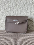 Kelly Vertical Pocket Clutch