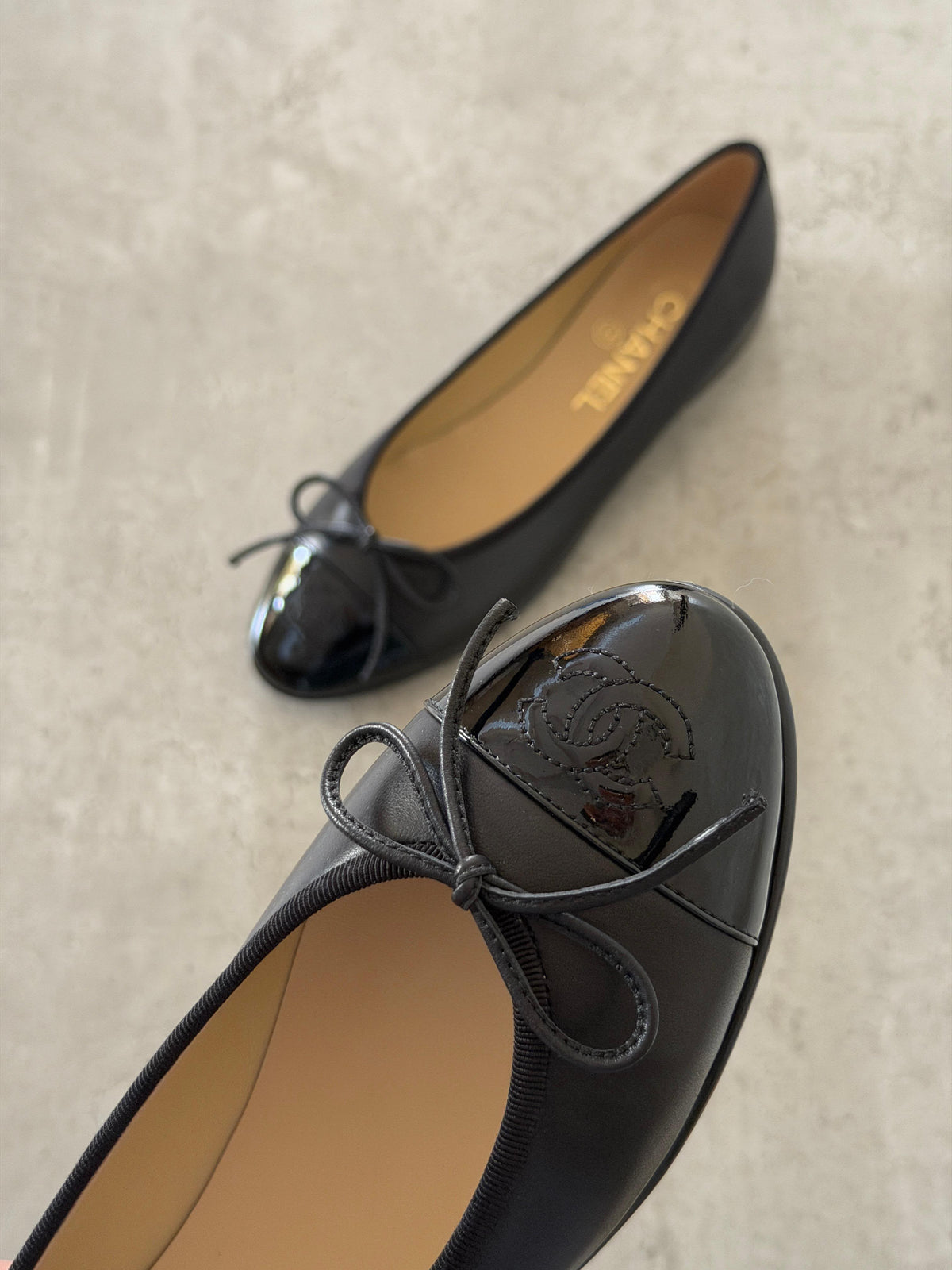 CHANEL Cap-Toe Bow Ballet Flats