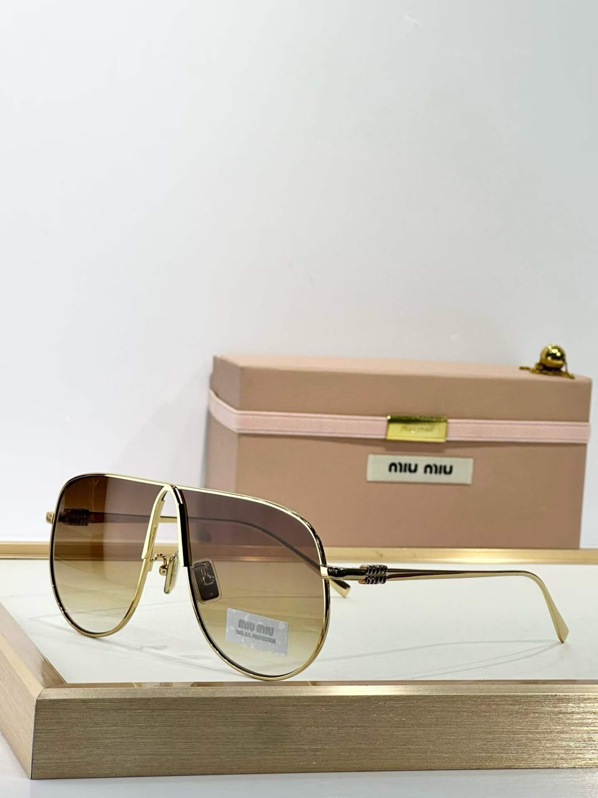 MIUMIU  Sunglasses