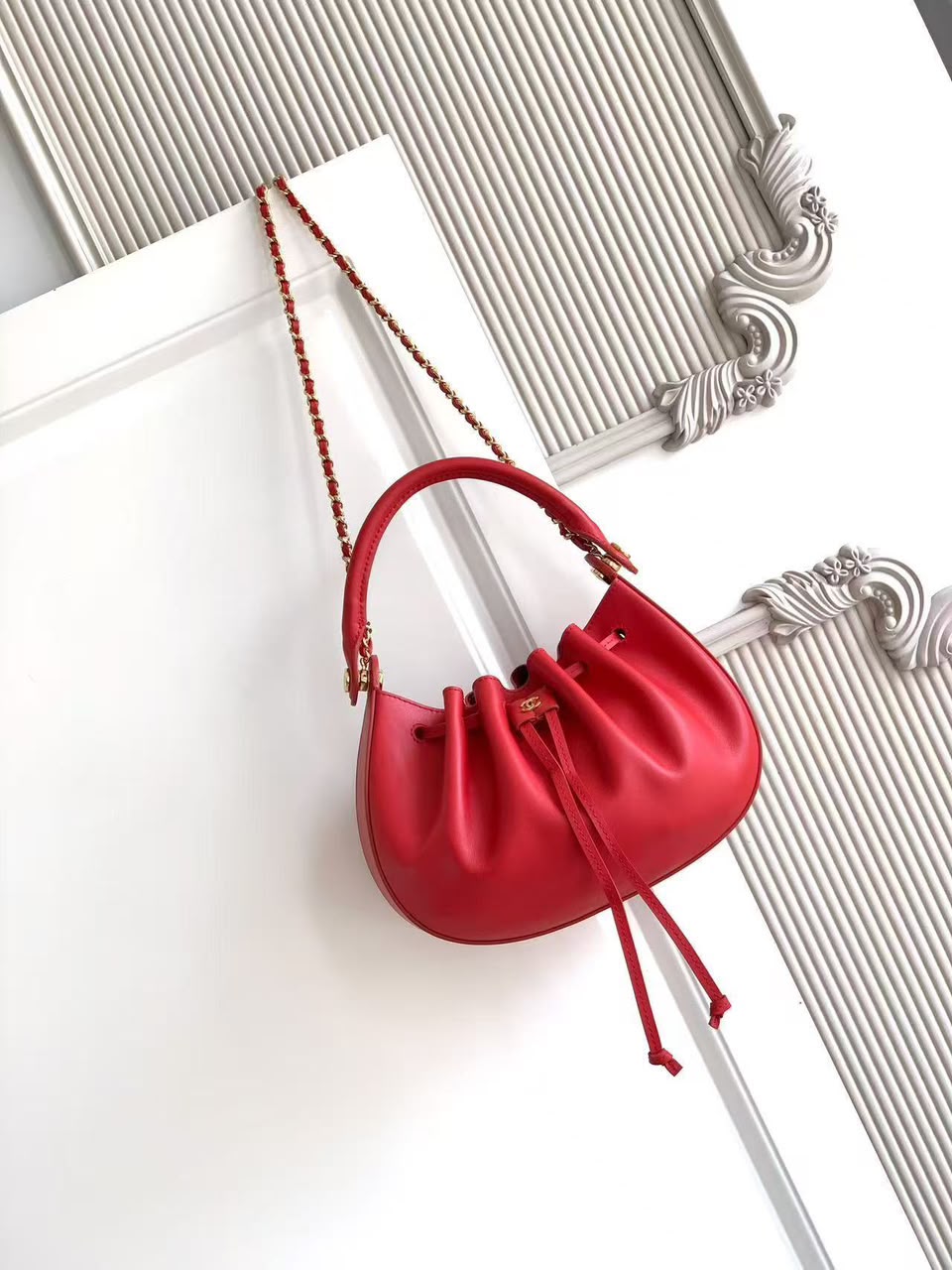 CHANEL Drawstring Top-Handle Chain Bag