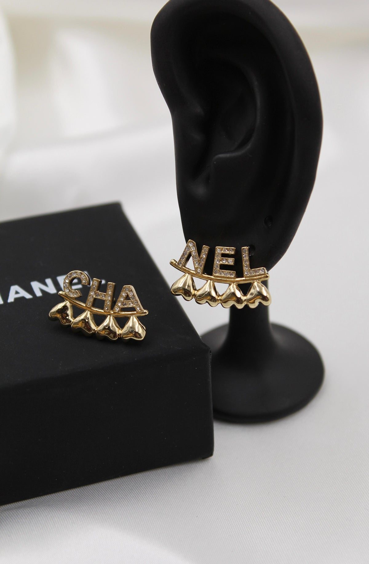 CHANEL – Gold Letter Logo Earrings