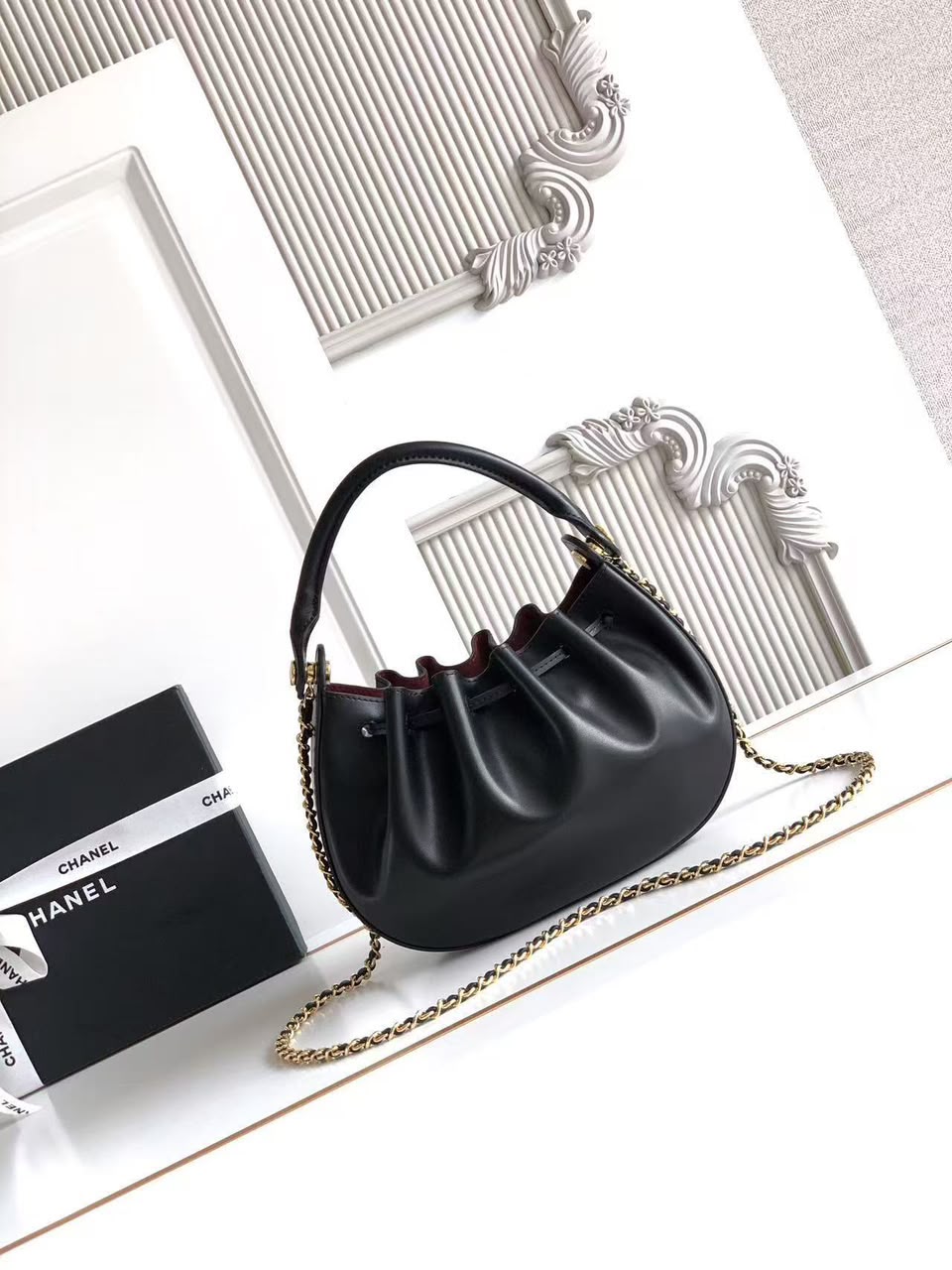 CHANEL Drawstring Top-Handle Chain Bag