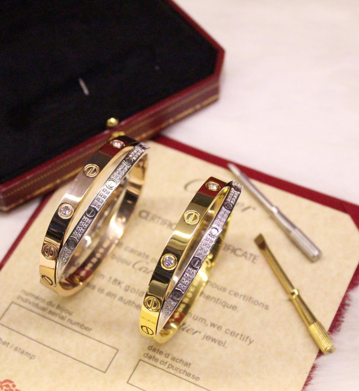 Cartier LOVE Bracelets in Yellow Gold and White Gold with Diamonds