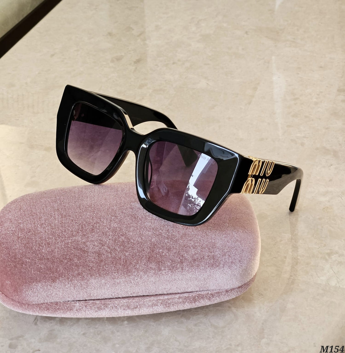 Miu Miu Bold Logo Cat Eye Sunglasses