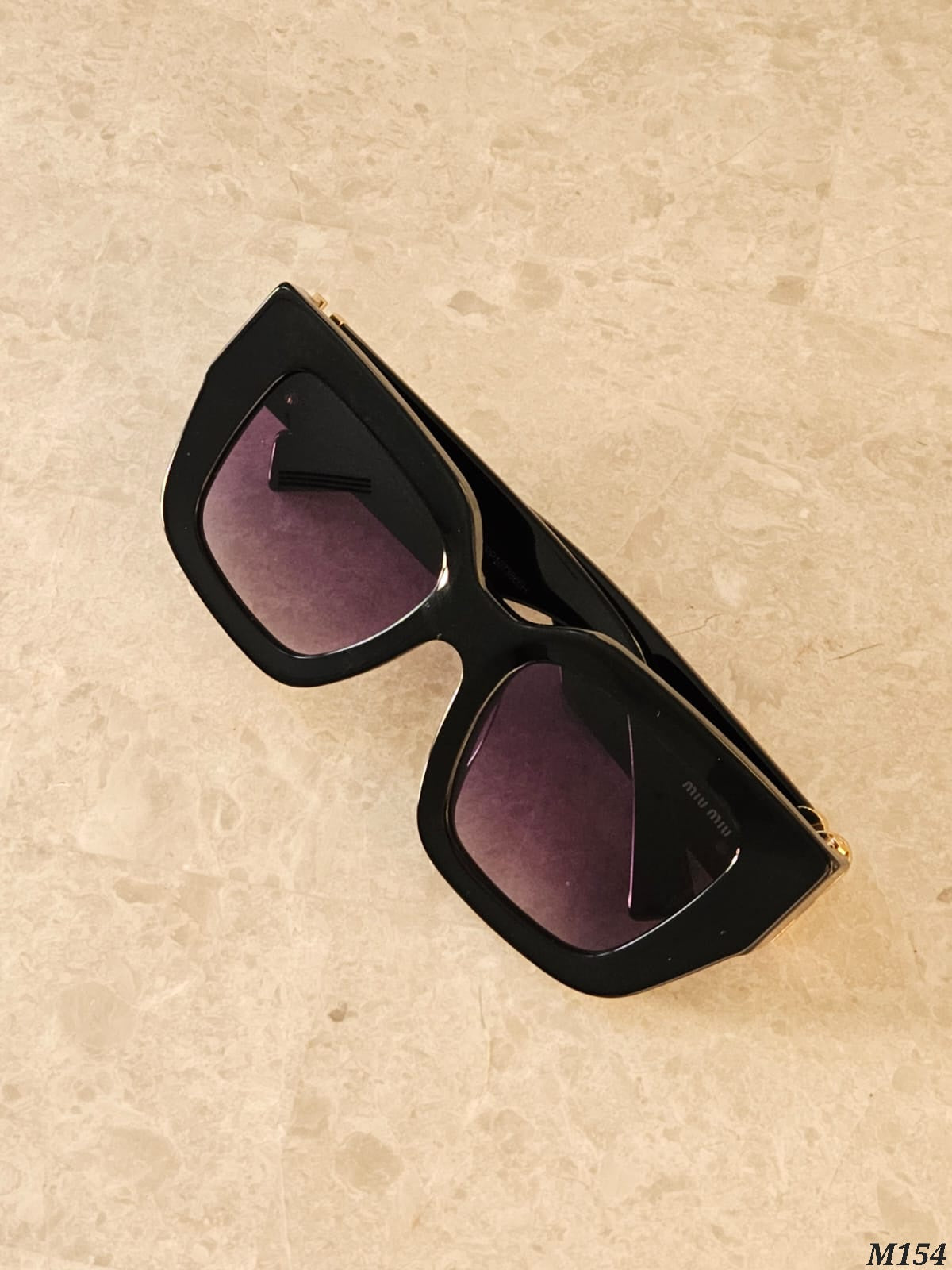 Miu Miu Bold Logo Cat Eye Sunglasses