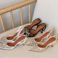 Amina Muaddi Embellished Lace Slingback Pumps
