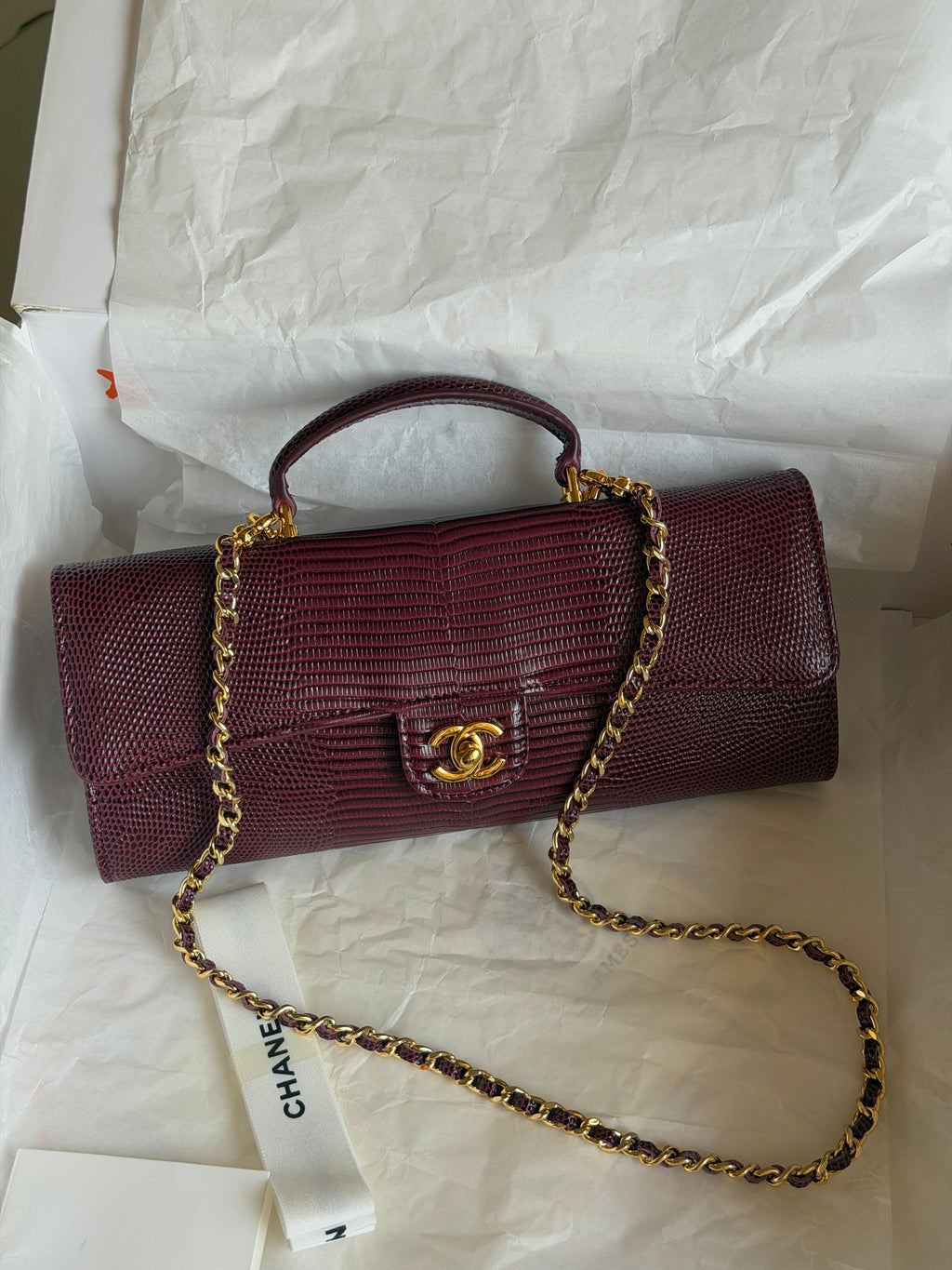 Chanel Clutch with Top Handle in lizard-embossed calfskin