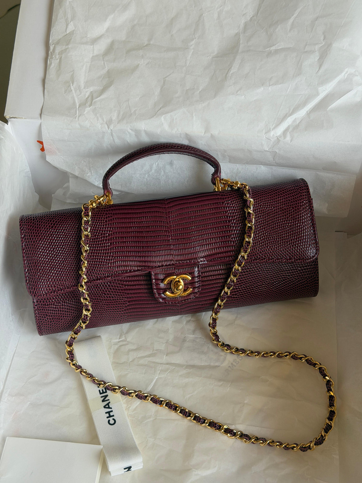 Chanel Clutch with Top Handle in lizard-embossed calfskin