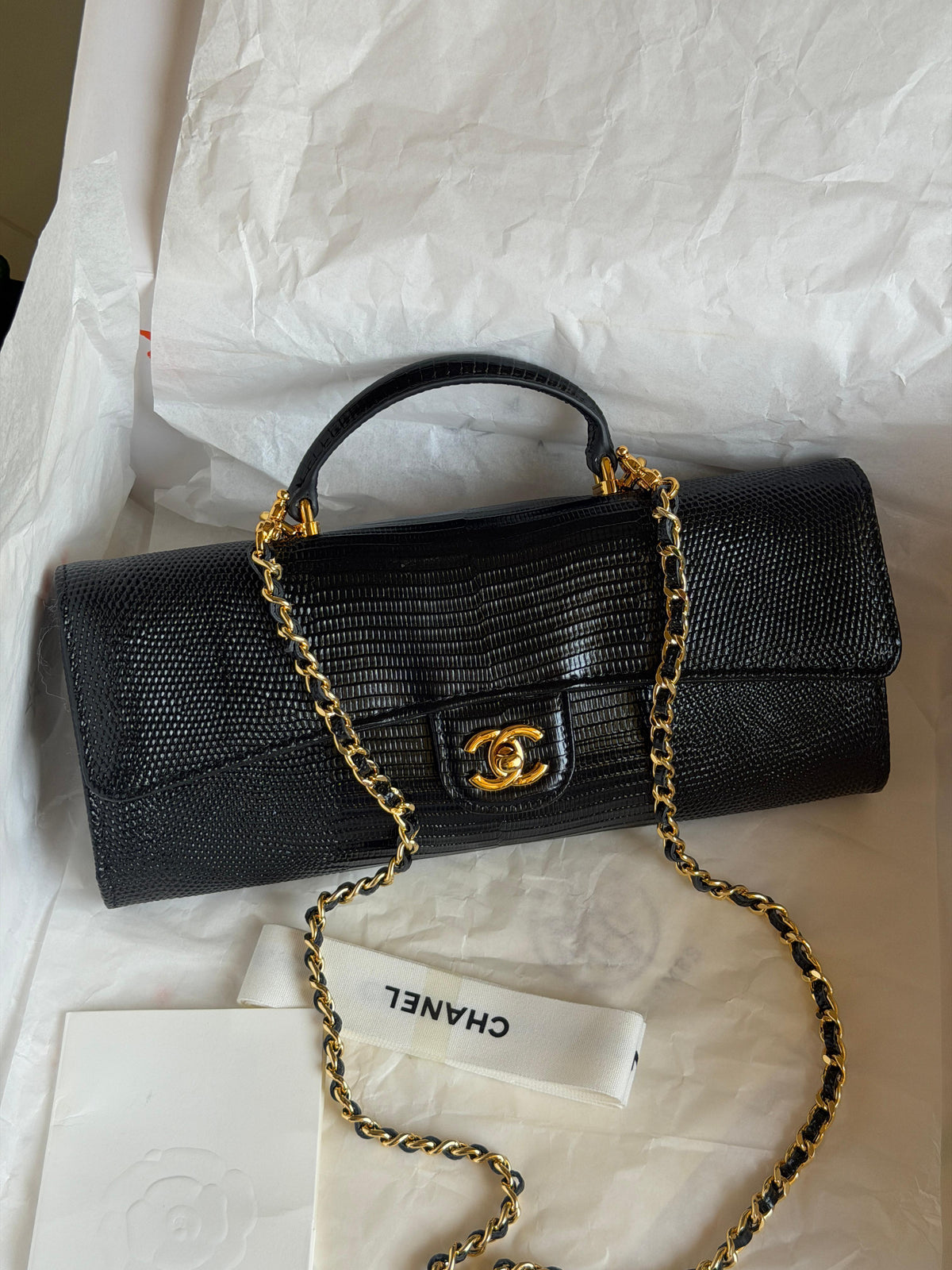 Chanel Clutch with Top Handle in lizard-embossed calfskin