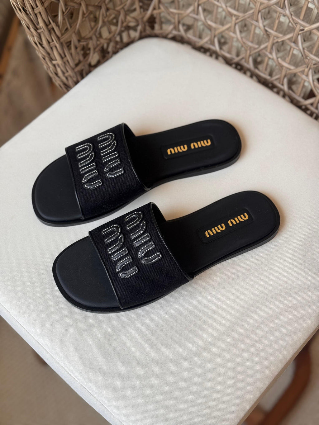 Miu Miu Canvas and leather slide sandals