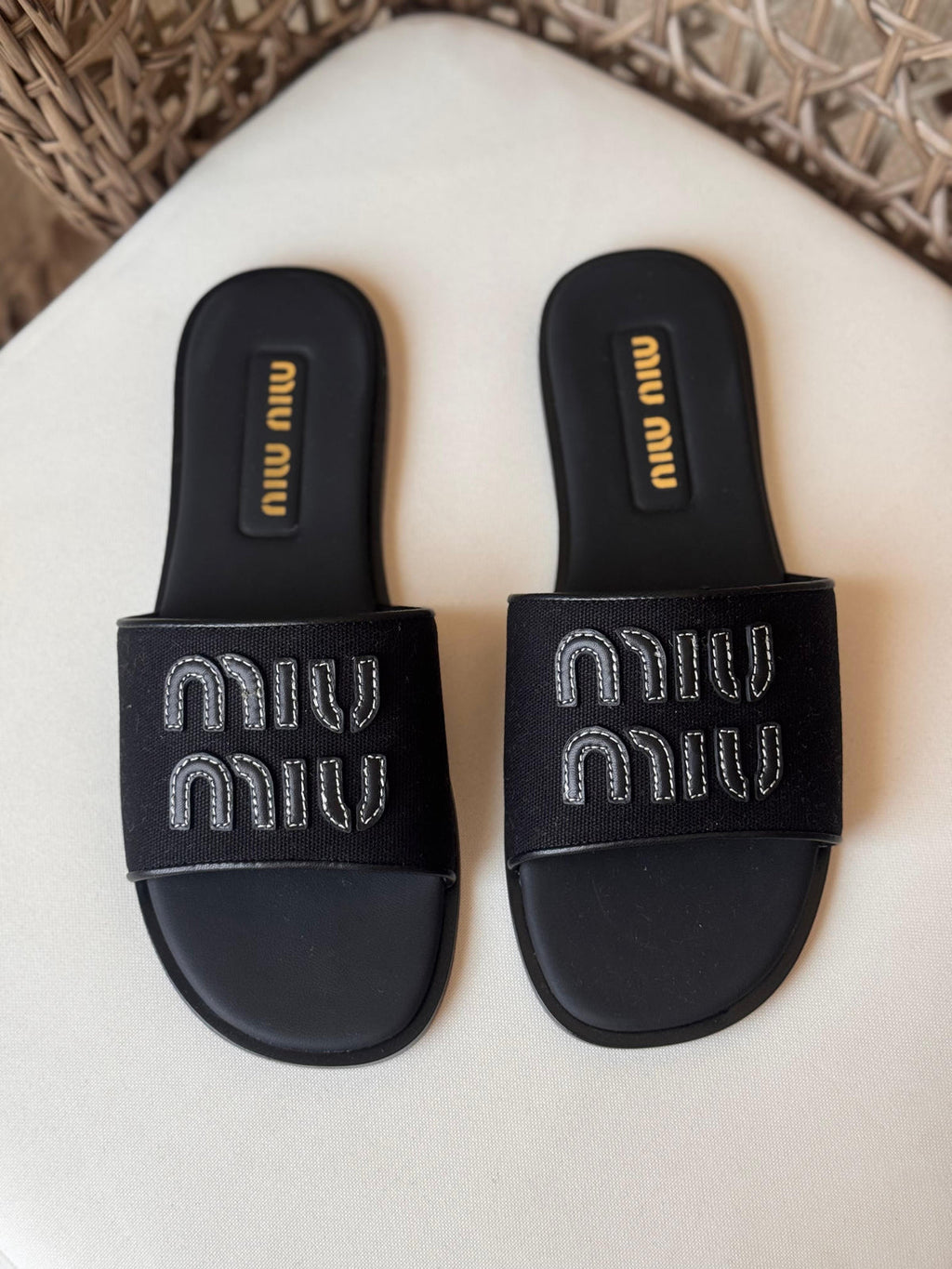 Miu Miu Canvas and leather slide sandals