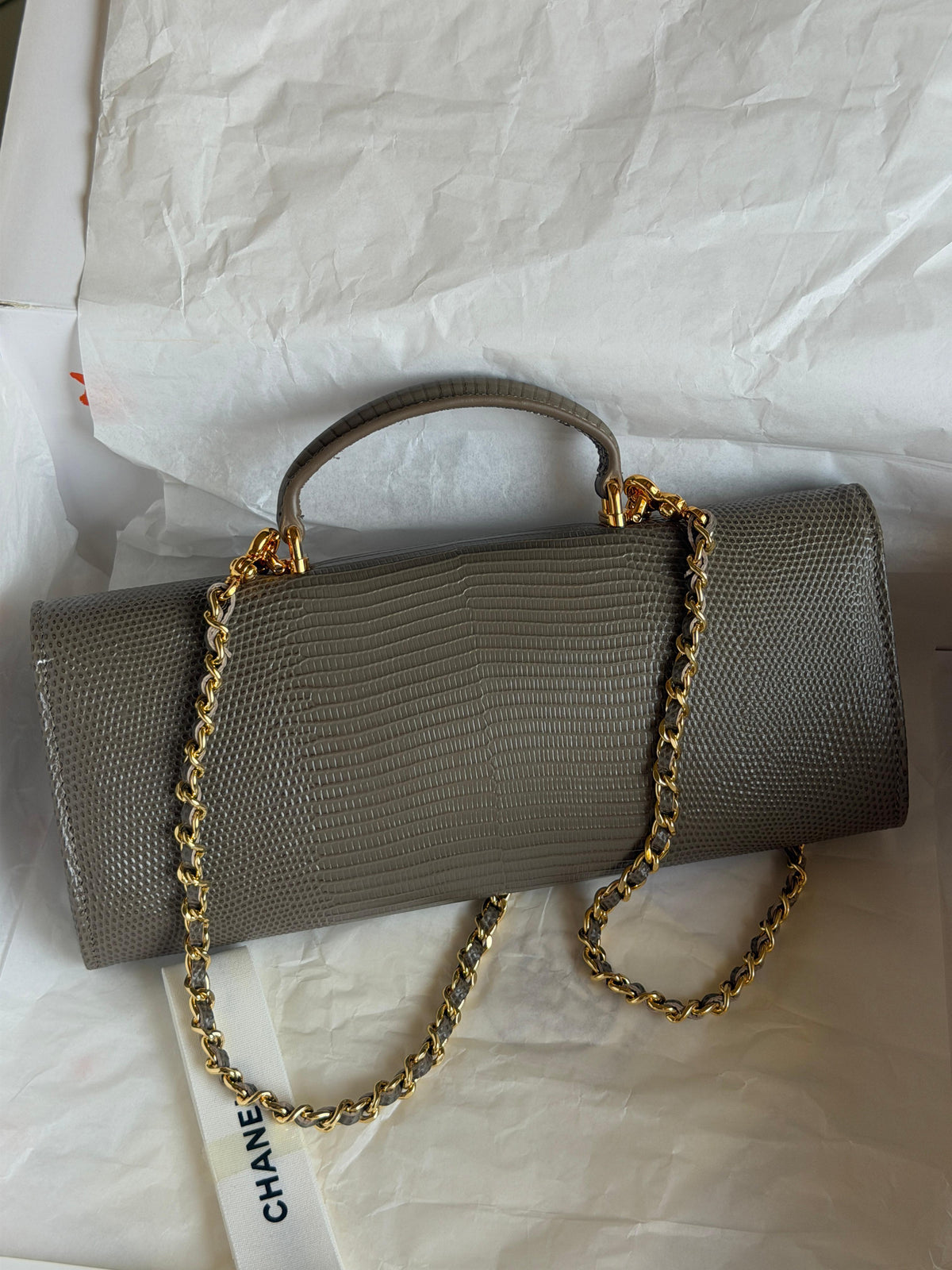 Chanel Clutch with Top Handle in lizard-embossed calfskin